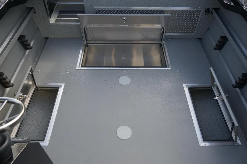 Slide: The Image of 2024 Thunder Jet 24 Alexis Pro HT boat interior storage compartments. - 8