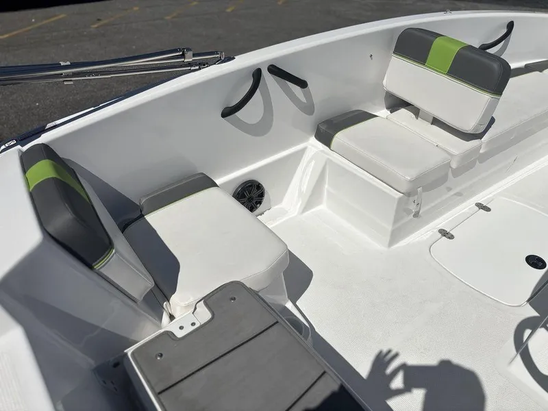 Slide: The Image of 2024 Tahoe T16 boat interior with white and green seating, featuring modern design and comfort. - 11