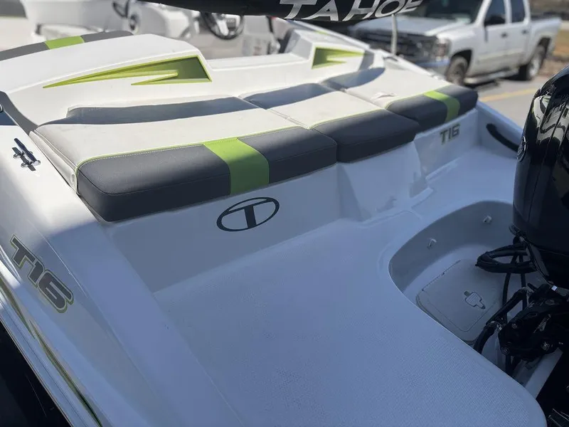Slide: The Image of 2024 Tahoe T16 boat with sleek seating and modern design. - 14