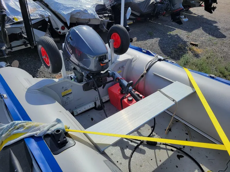 Slide: The Image of Sea Eagle 14SR inflatable boat with 2021 Yamaha 20 hp motor and aluminum trailer. - 12