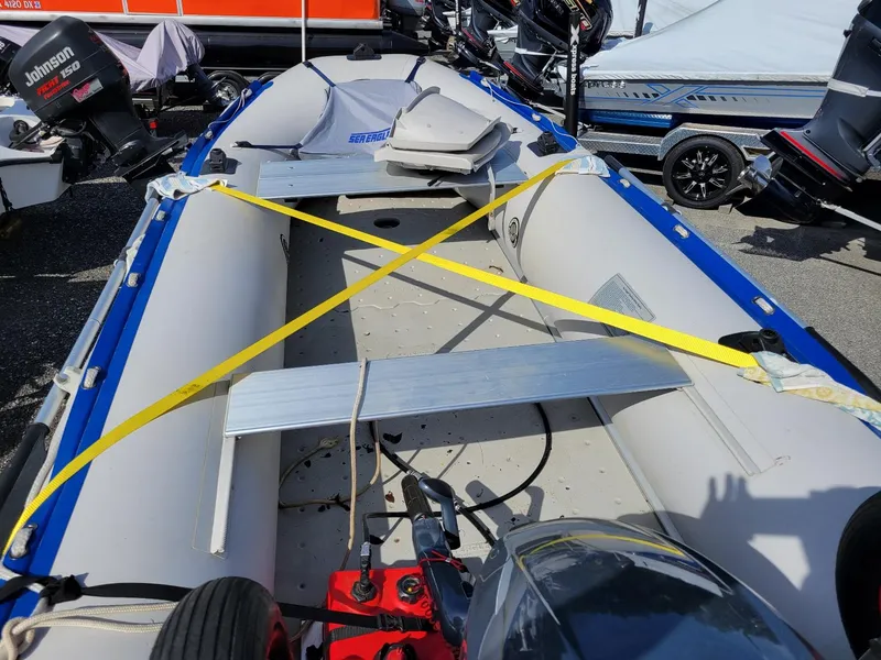 Slide: The Image of Sea Eagle 14SR inflatable boat with Yamaha 20 hp engine on aluminum trailer. - 6