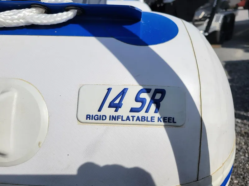 Slide: The Image of Sea Eagle 14SR inflatable boat with rigid keel, close-up view. - 7
