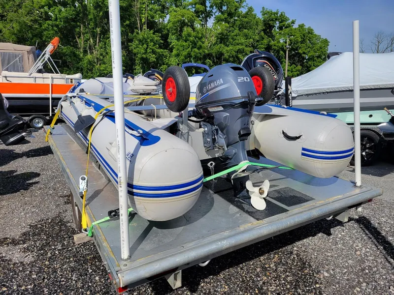 Slide: The Image of Sea Eagle 14SR inflatable boat with 2021 Yamaha 20 hp motor on aluminum trailer. - 9