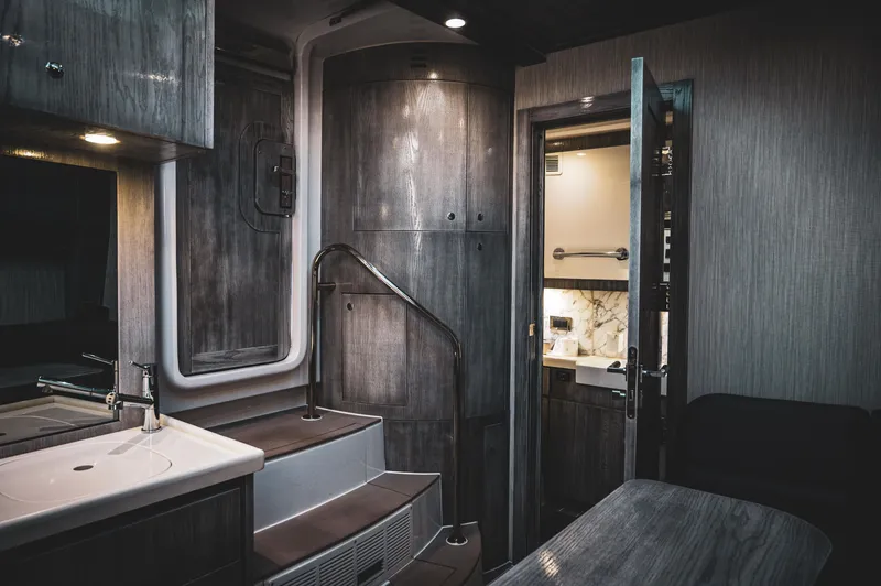 Slide: The Image of Luxurious interior of 2023 HCB 65 Estrella yacht featuring modern bathroom and sleek design. - 3