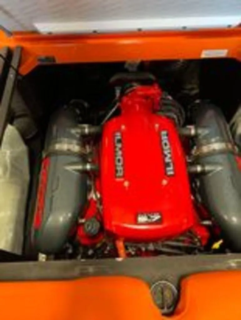 Slide: The Image of 2014 MasterCraft X30 boat engine with red Ilmor cover. - 9