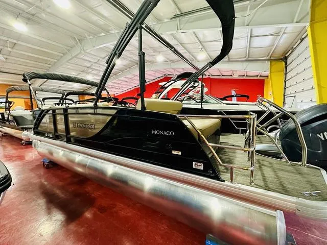 Slide: The Image of 2024 Godfrey Pontoons Monaco 235 SFL GTP 27 In. Center Tube Package in showroom. - 3