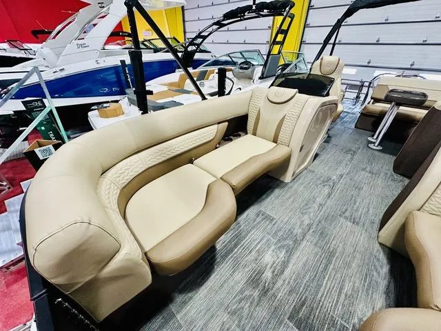 Slide: The Image of 2024 Godfrey Pontoons Monaco 235 SFL GTP 27 In. Center Tube Package interior with luxurious seating. - 8