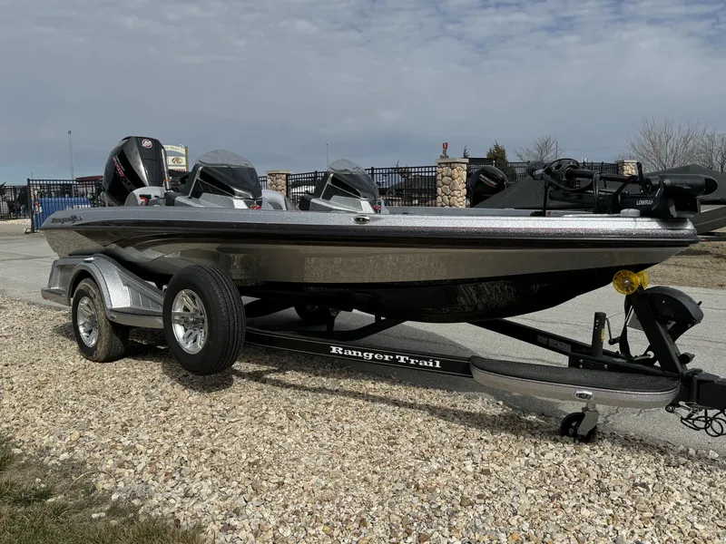 Slide: The Image of 2024 Ranger Z518 Ranger Cup Equipped boat on trailer, side view. - 3