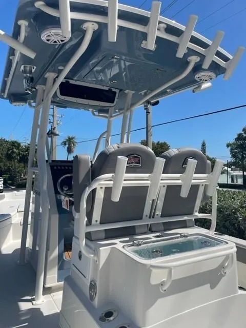 Slide: The Image of 2024 Ranger 2660 Bay boat with T-top and dual seats. - 2