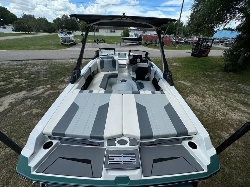 Slide: The Image of 2024 Malibu LX-R boat with spacious seating and modern design. - 25