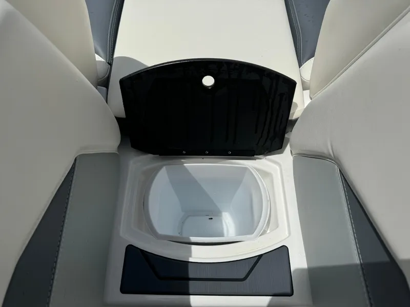 Slide: The Image of 2024 Malibu LX-R boat interior with open storage compartment. - 9