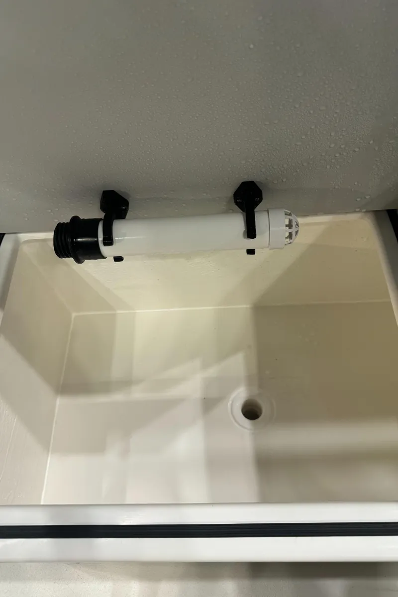 Slide: The Image of 2024 Defiance 260 Admiral EX boat cabin door and seating area. - 15