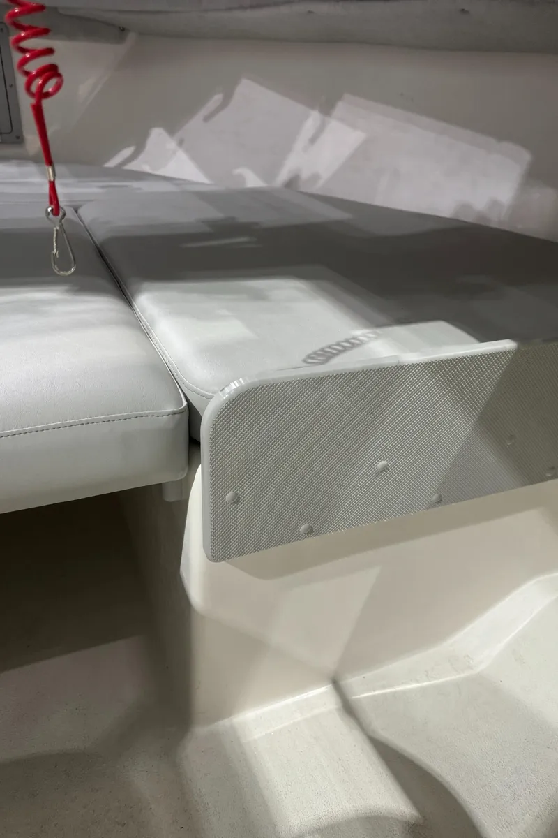 Slide: The Image of 2024 Defiance 260 Admiral EX cabin interior with cushioned seating. - 34