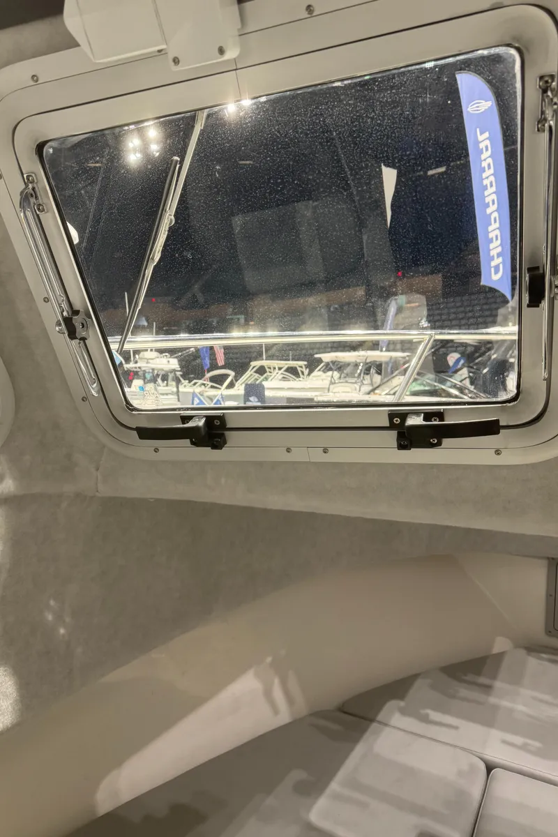 Slide: The Image of 2024 Defiance 260 Admiral EX captain's chair with gray and white upholstery. - 37