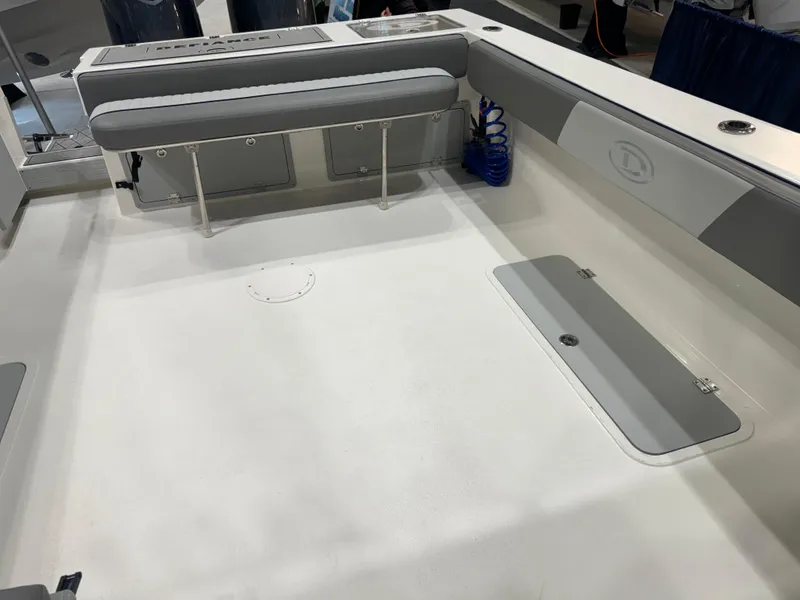 Slide: The Image of 2024 Defiance 260 Admiral EX open storage compartment. - 8