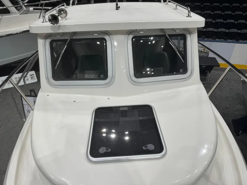 Slide: The Image of 2024 Defiance 260 Admiral EX boat interior at a boat show. - 31
