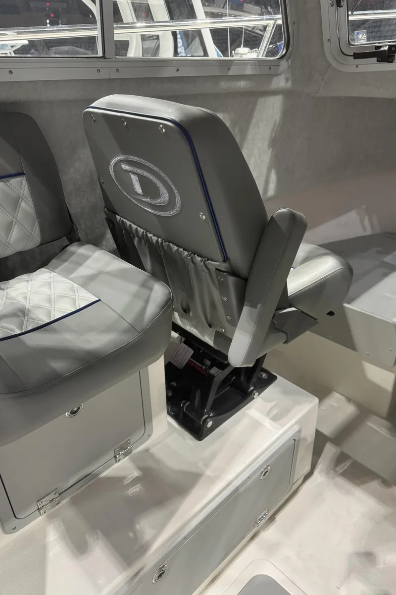 Slide: The Image of 2024 Defiance 260 Admiral EX boat cabin with windows and hatch. - 32