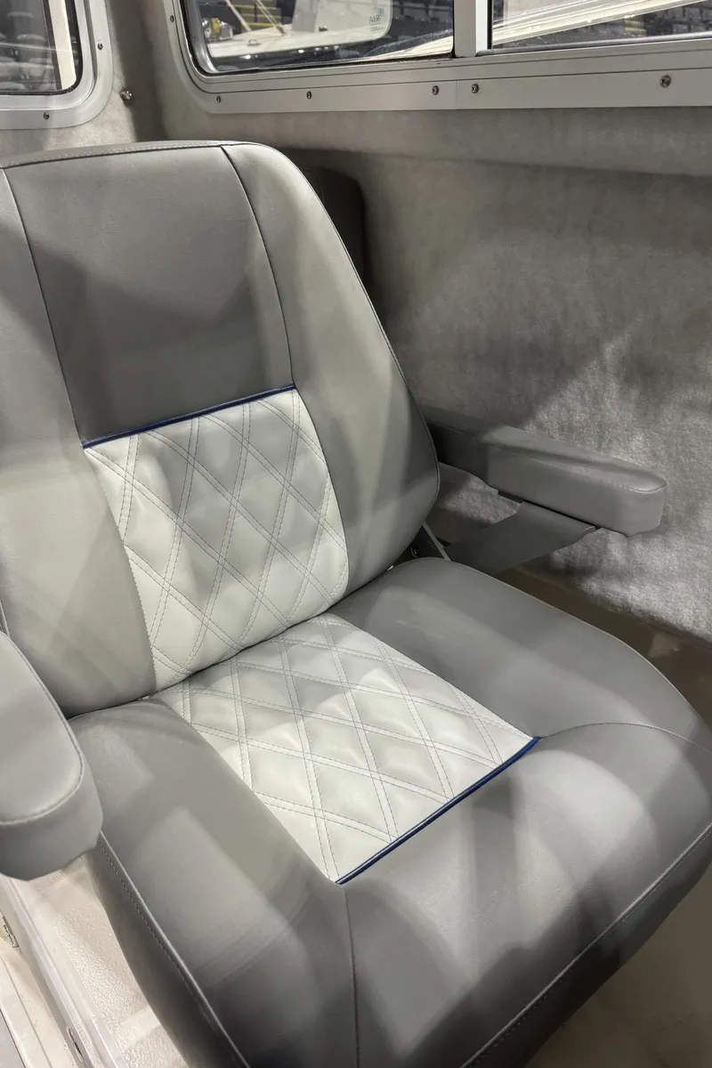 Slide: The Image of 2024 Defiance 260 Admiral EX boat interior seating area. - 35