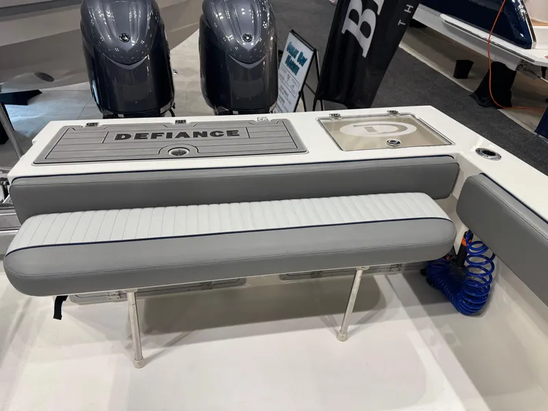 Slide: The Image of 2024 Defiance 260 Admiral EX boat livewell with transparent lid and logo. - 9