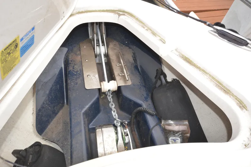 Slide: The Image of Anchor storage compartment of a 2012 Pursuit 280 boat. - 20