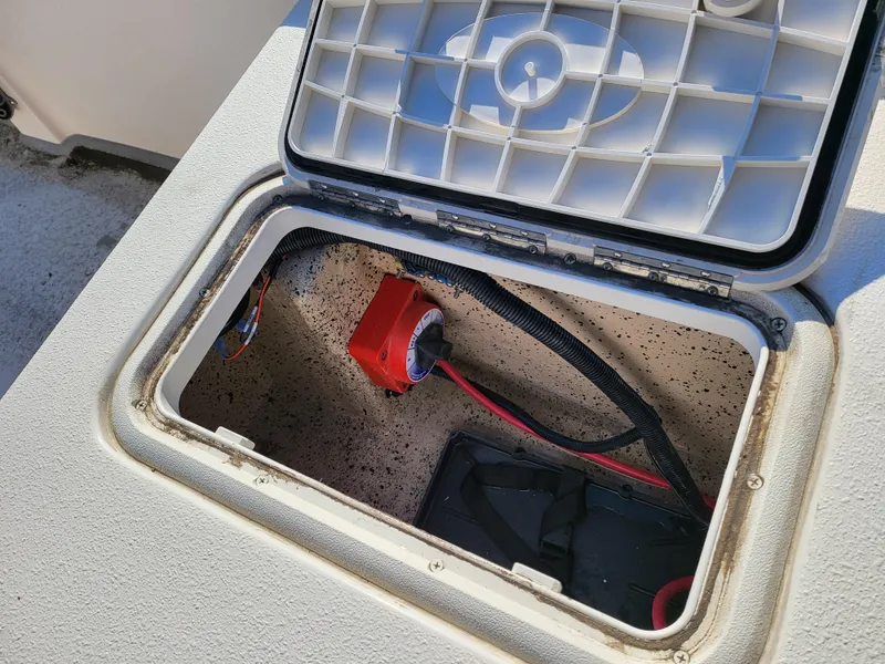 Slide: The Image of Open storage compartment of 2024 Carolina Skiff E16 JVX TH boat. - 11