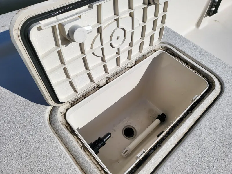 Slide: The Image of Open storage compartment of 2024 Carolina Skiff E16 JVX TH boat. - 12