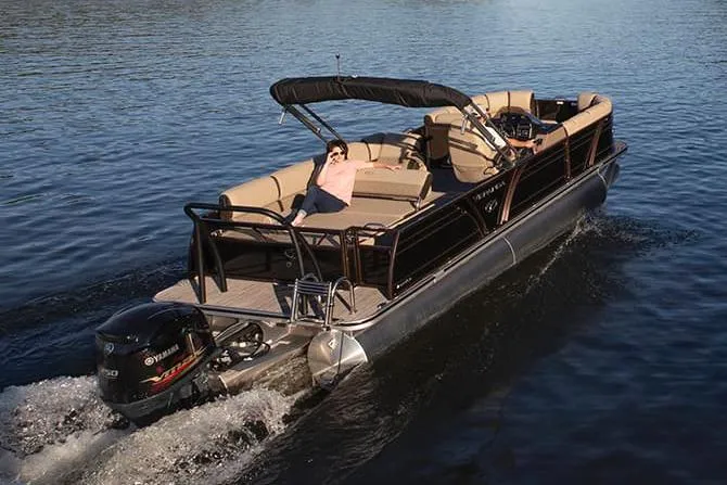 Slide: The Image of 2024 Veranda VP 22VLB boat interior with steering wheel and control panel. - 1