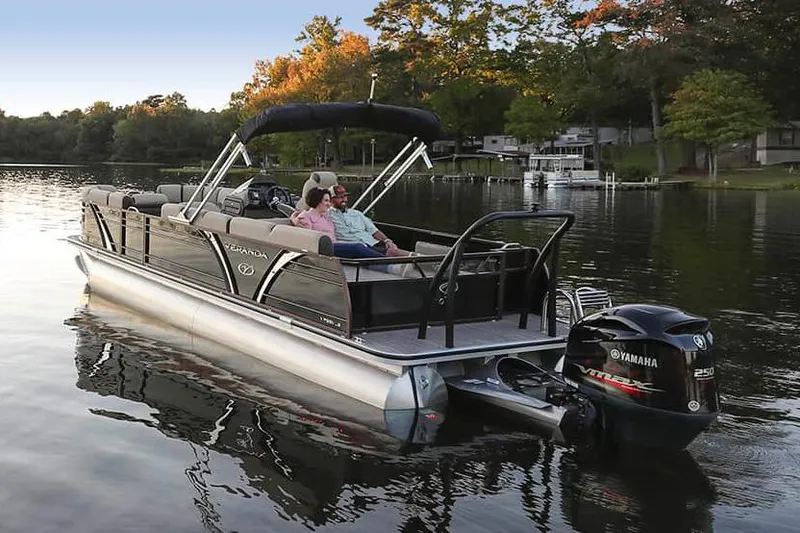 Slide: The Image of 2024 Veranda VP 22VLB pontoon boat interior with luxurious seating in a spacious warehouse. - 3