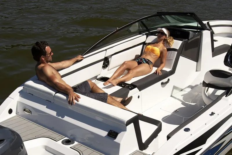 Slide: The Image of 2024 Monterey M-225 boat interior with sleek seating and modern dashboard design. - 4