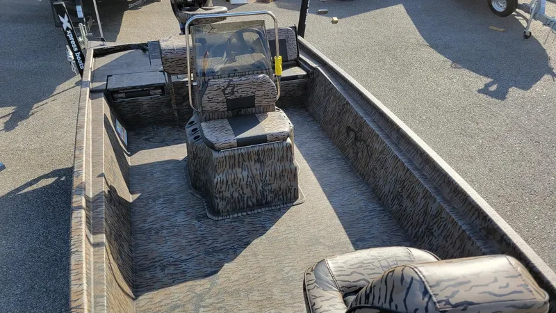Slide: The Image of 2025 Xpress XP20CC center console boat with Yamaha Vmax 90 engine, camo interior. - 5