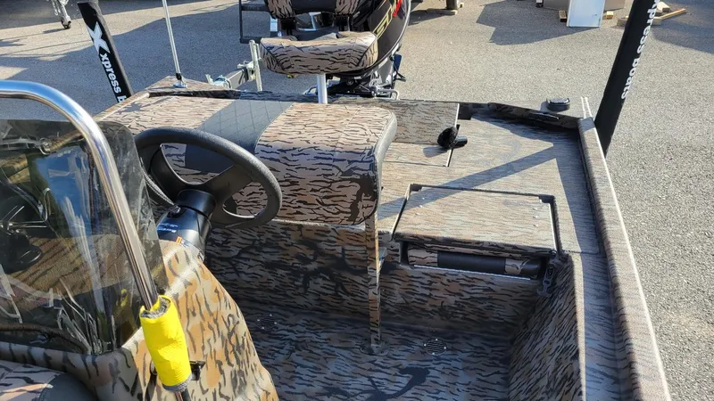 Slide: The Image of 2025 Xpress XP20CC center console boat with Yamaha Vmax 90 engine, camo design. - 7