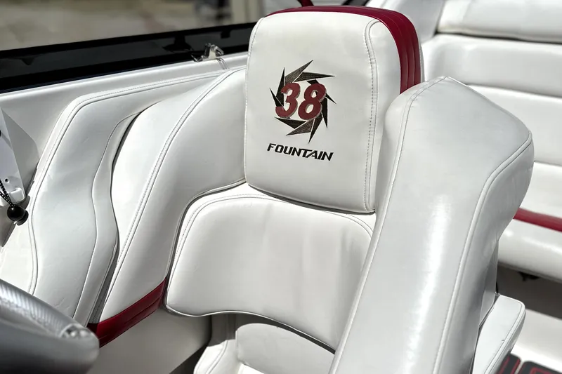 Slide: The Image of 2003 Fountain 38 Lightning boat interior with white and red upholstery. - 10