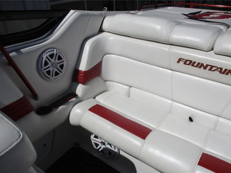 Slide: The Image of 2003 Fountain 38 Lightning boat interior with white and red seating. - 17
