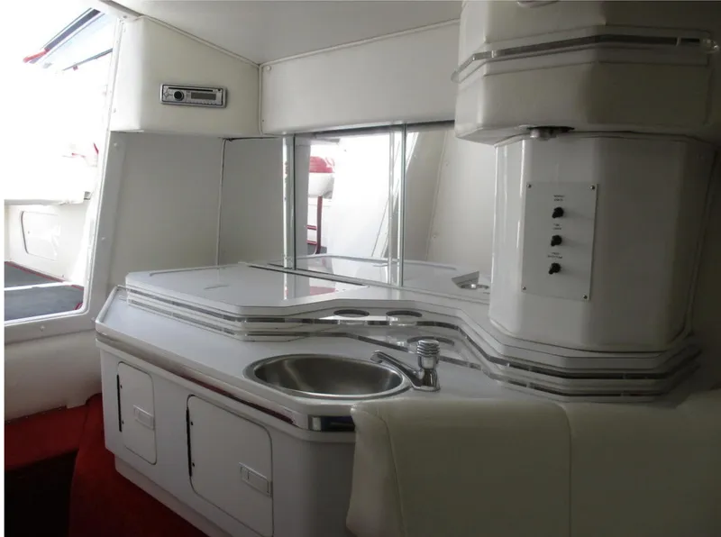 Slide: The Image of Interior of 2003 Fountain 38 Lightning boat with sink and storage cabinets. - 20