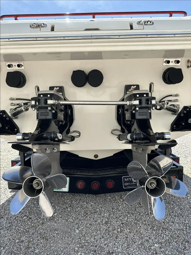 Slide: The Image of Rear view of a 2003 Fountain 38 Lightning boat with dual propellers. - 7