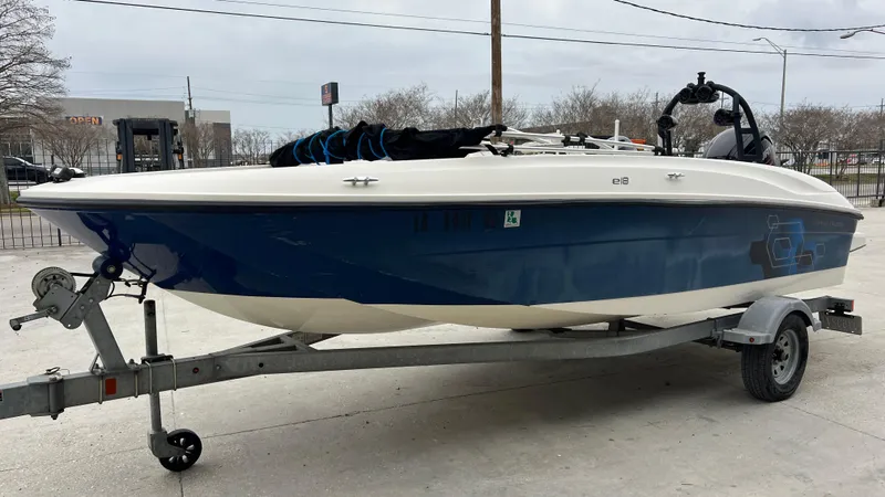 Slide: The Image of 2017 Bayliner Element E 18 boat on a trailer. - 5