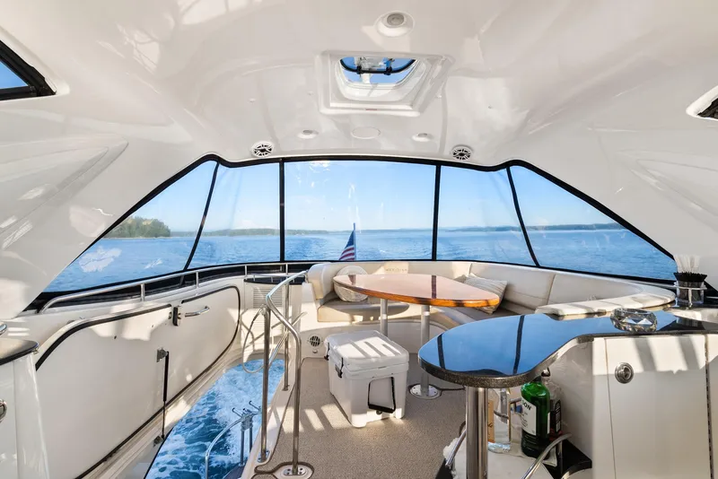 Slide: The Image of Luxurious interior of 2012 Meridian 541 Sedan yacht with panoramic ocean view. - 28
