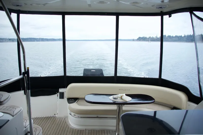 Slide: The Image of 2012 Meridian 541 Sedan yacht interior with scenic water view. - 36
