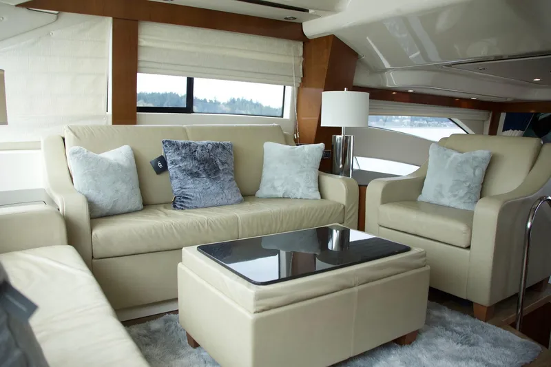 Slide: The Image of Luxurious interior of a 2012 Meridian 541 Sedan yacht with plush seating and elegant decor. - 42