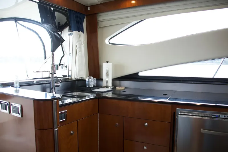 Slide: The Image of Luxurious kitchen interior of 2012 Meridian 541 Sedan yacht with modern amenities. - 48