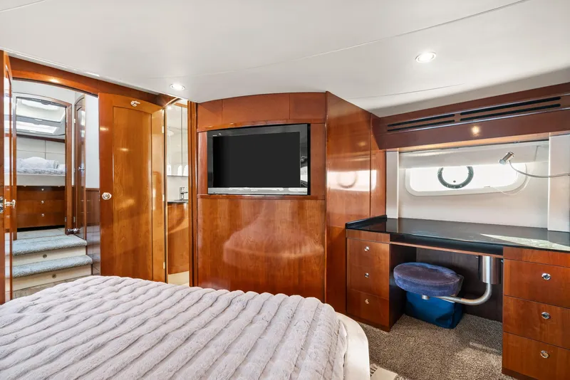 Slide: The Image of Luxurious interior of 2012 Meridian 541 Sedan yacht with wood paneling and modern amenities. - 49