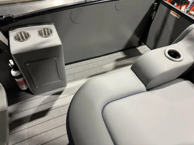 Slide: The Image of 2024 Avalon Catalina boat cockpit with steering wheel and control panel. - 15