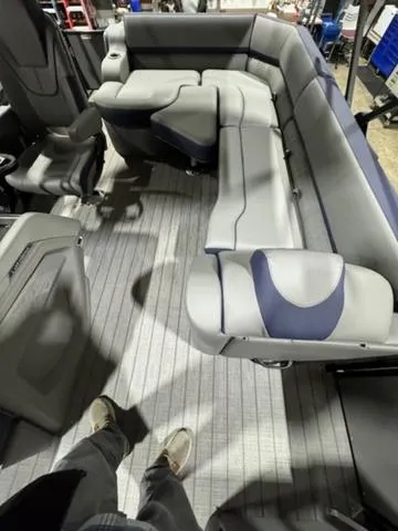 Slide: The Image of 2024 Avalon Catalina boat dashboard with steering wheel and gauges. - 16