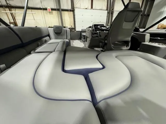 Slide: The Image of 2024 Avalon Catalina Rear J Lounger 23 FT boat interior with luxurious seating. - 17
