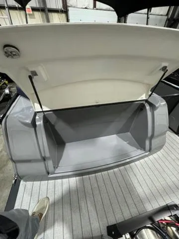 Slide: The Image of 2024 Avalon Catalina Rear J Lounger 23 FT interior with luxurious seating and modern design. - 20