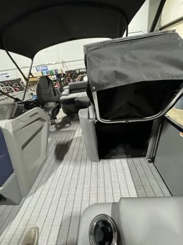 Slide: The Image of 2024 Avalon Catalina Rear J Lounger 23 FT interior with gray seating and striped flooring. - 27