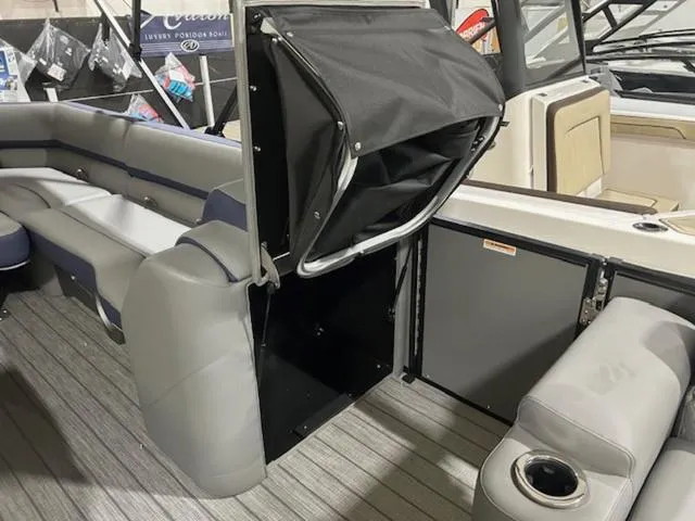 Slide: The Image of 2024 Avalon Catalina Rear J Lounger with cup holders and sleek design. - 33