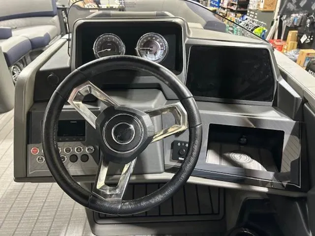 Slide: The Image of 2024 Avalon Catalina Rear J Lounger 23 FT boat interior with plush seating. - 34