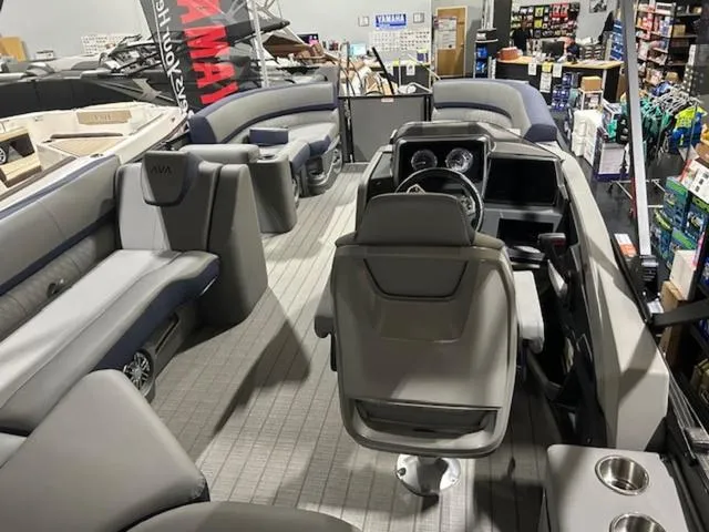 Slide: The Image of 2024 Avalon Catalina Rear J Lounger dashboard with steering wheel and gauges. - 37