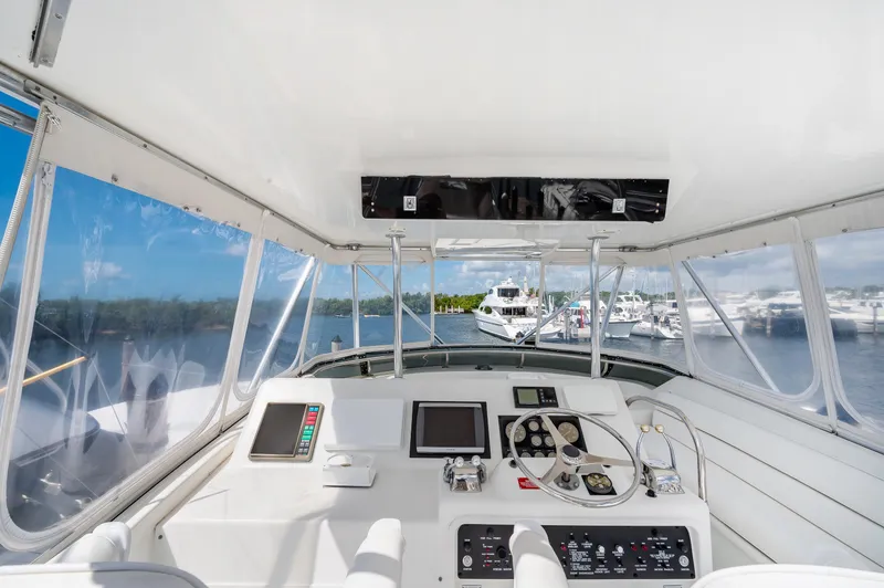 Slide: The Image of Interior helm of 1992 Hatteras 50 Convertible yacht with navigation equipment. - 16